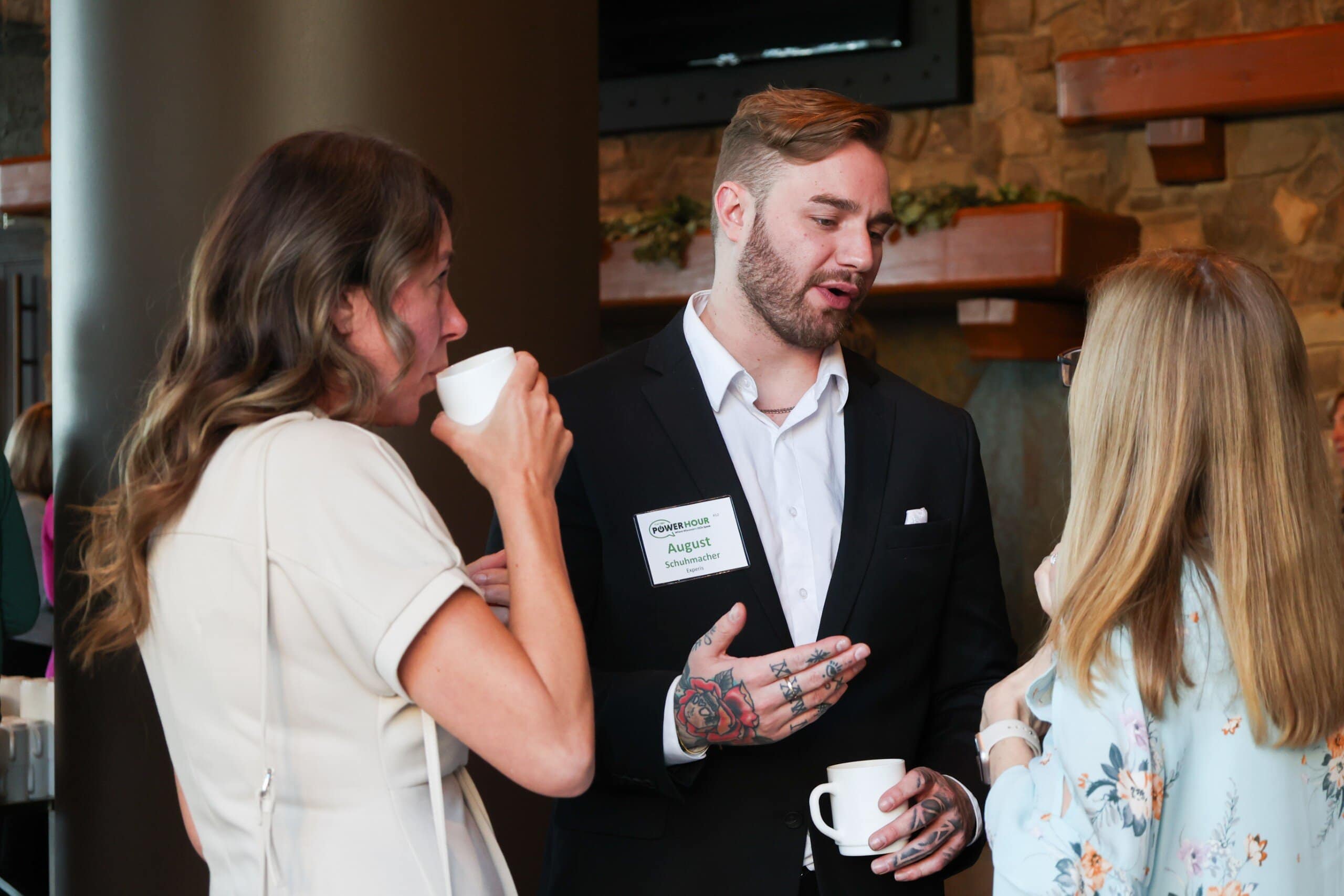 7E0A7727-1 People networking and drinking coffee at event